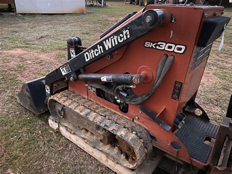 ditch witch mini skid steer attachments|mini skid steer tiller attachment.